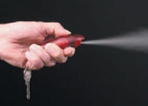 Spitfire pepper spray can be deployed by pointing your thumb.