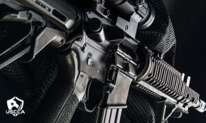 An AR-15 on a black background.