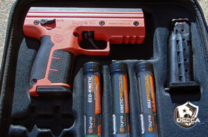 The SD Launcher from Byrna in its soft-shell case with canisters of each projectile option.