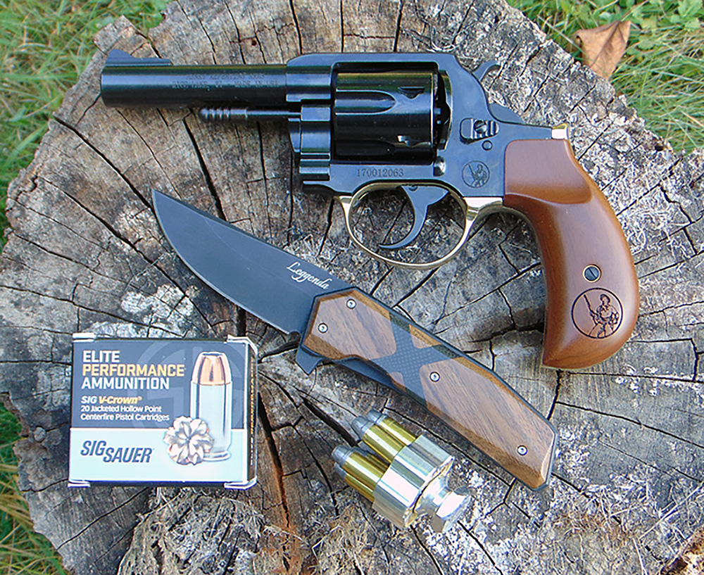 Duty revolver and .357 Magnum ammunition shown to illustrate law enforcement use and cartridge evolution