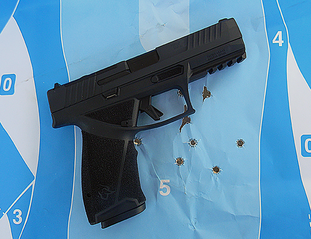 The Taurus TX9 on a silhouette target.